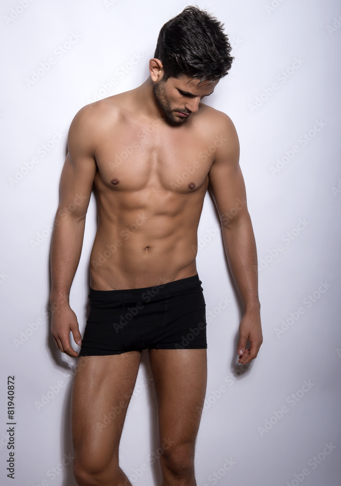 handsome muscular young bodybuilder handsome muscular young bodybuilder