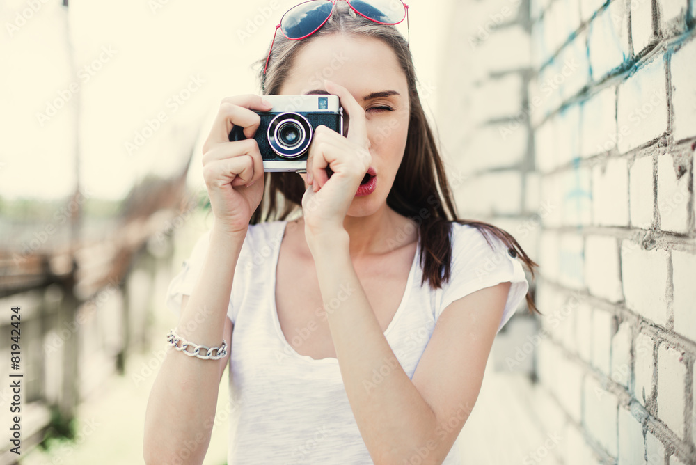 beautiful brunette and the old camera