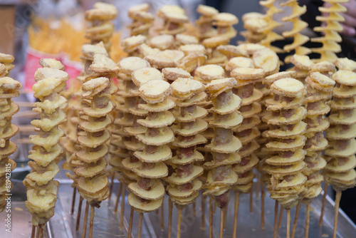 Photography Fried chopped potatoes stick closeup
