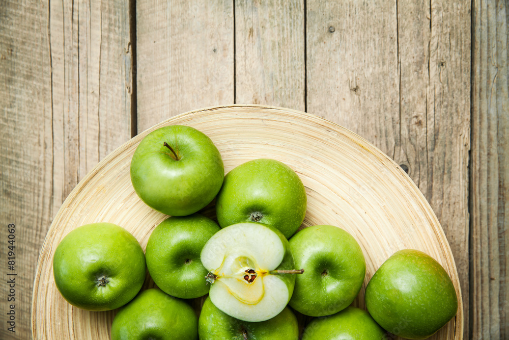 fruit. apples in a bowl on wooden background fruit. apples in a bowl on wooden background