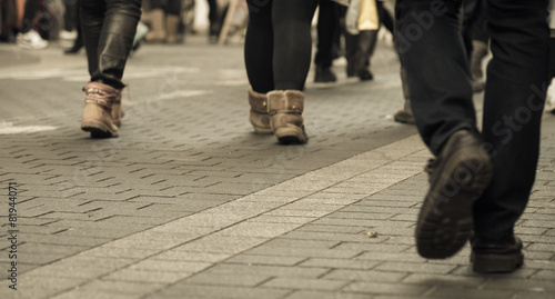 Walking people on the street © PeoGeo
