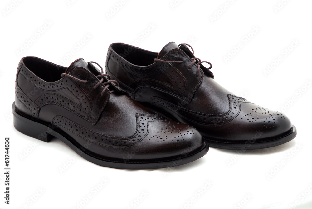 Classic leather men shoes isolated on white background. Male