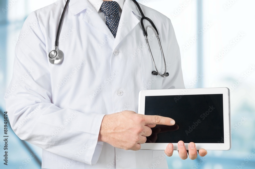 Man. Close up of male doctor holding smartphone with medical app Man. Close up of male doctor holding smartphone with medical app