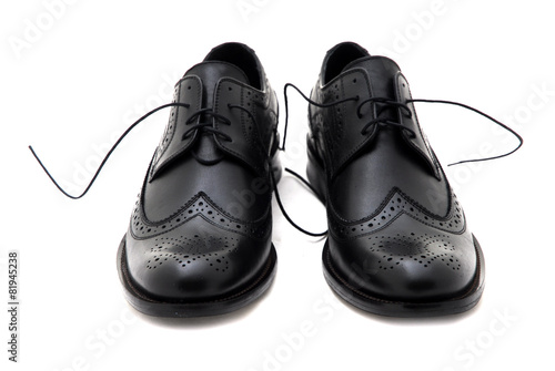 Classic leather men shoes isolated on white background. Male