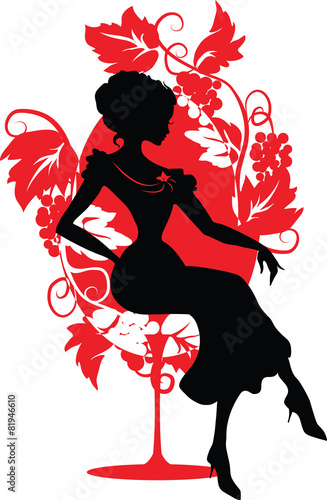 Silhouette of woman sitting on a chair