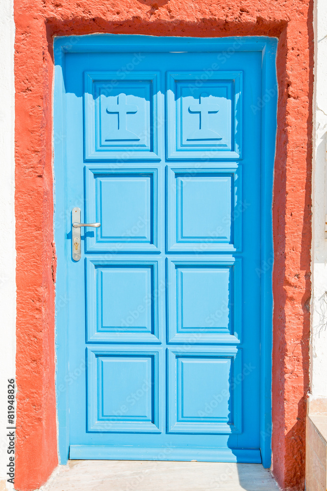 blue door on Santorini in Greece