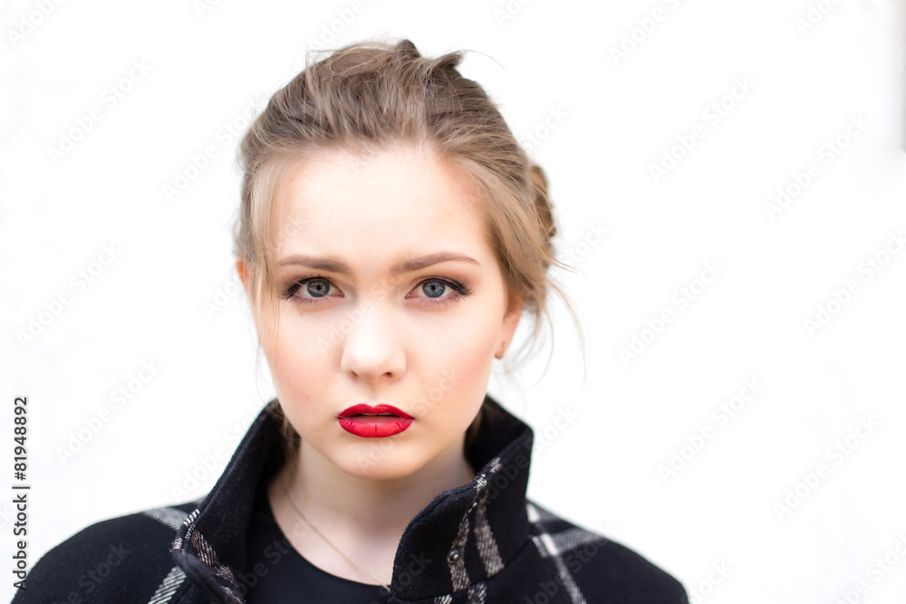 portrait of a beautiful girl in high key against a white wall portrait of a beautiful girl in high key against a white wall