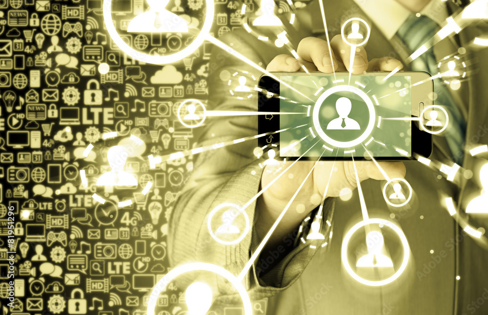 Obraz premium Business Hand holding a phone show the social network