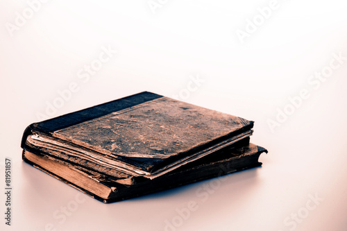 Beautiful old two books closeup on white background
