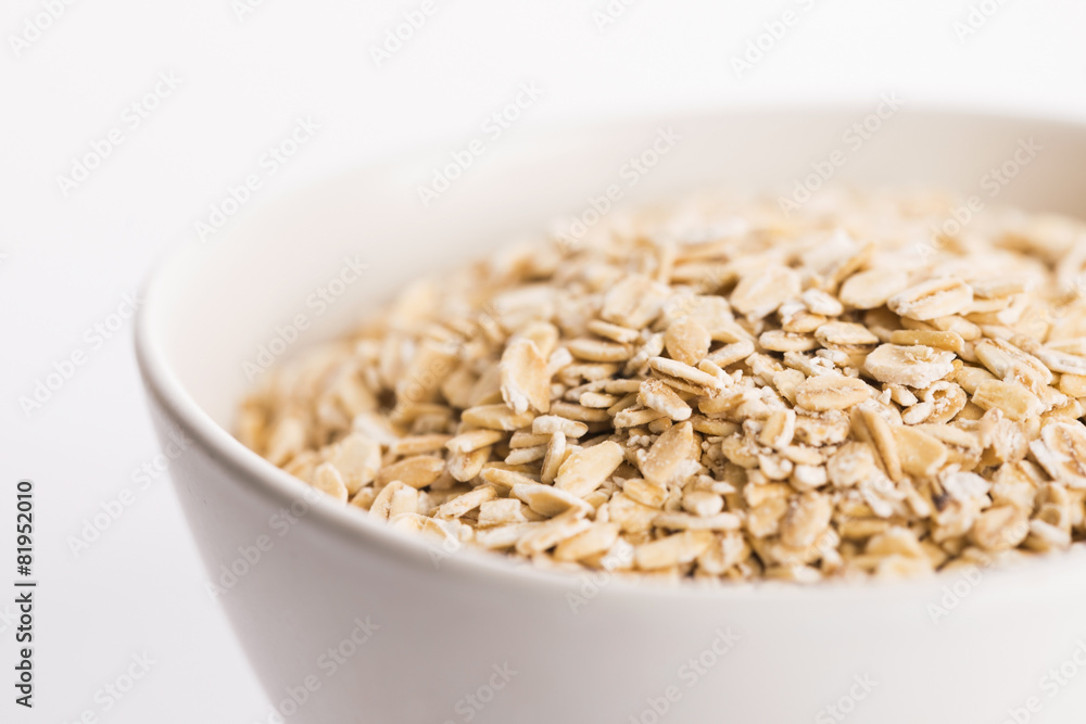 Oat flakes in bowl Oat flakes in bowl