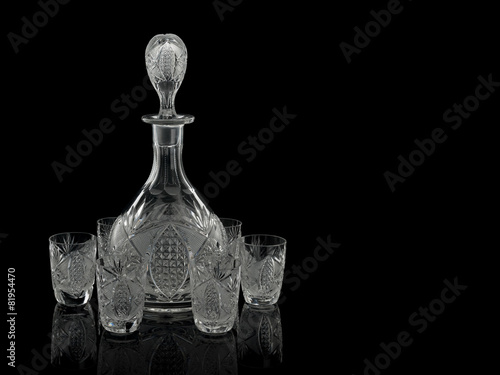 Cut crystal decanter and six piles