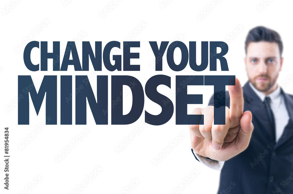 Business man pointing the text: Change Your Mindset Business man pointing the text: Change Your Mindset
