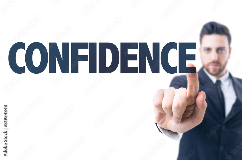Business man pointing the text: Confidence Business man pointing the text: Confidence