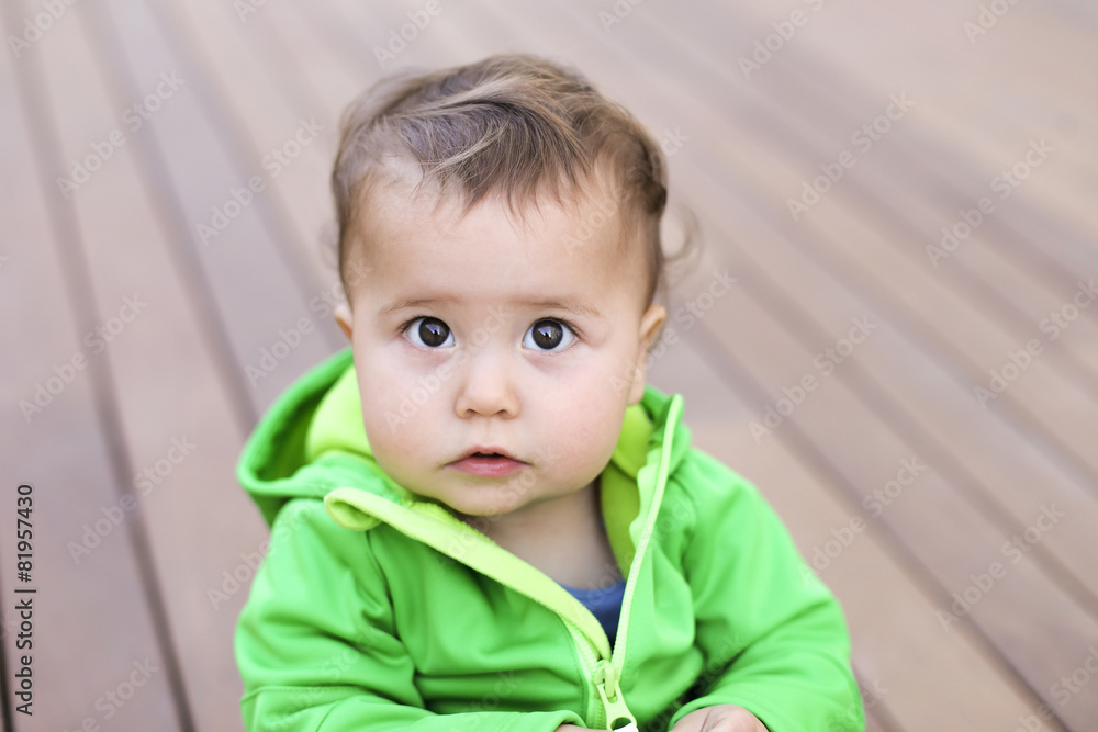 baby playing on the floor