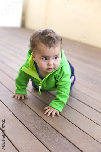 baby playing on the floor