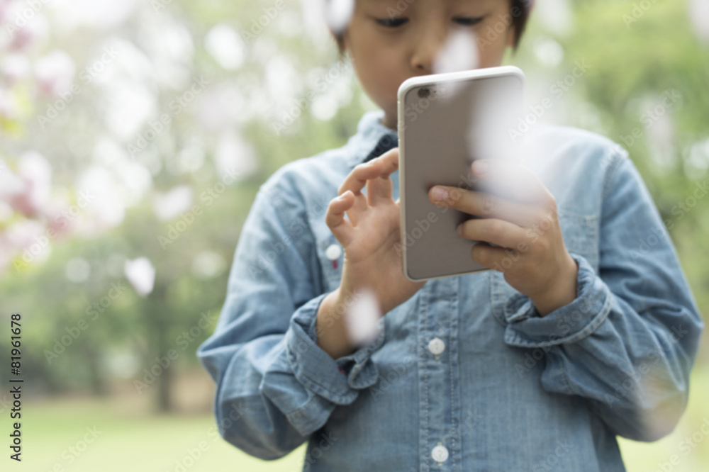 Boy obsessed with smartphone