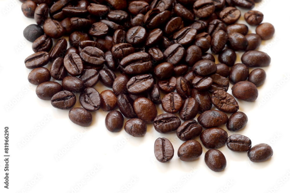 Brown coffee beans isolated on white background Brown coffee beans isolated on white background