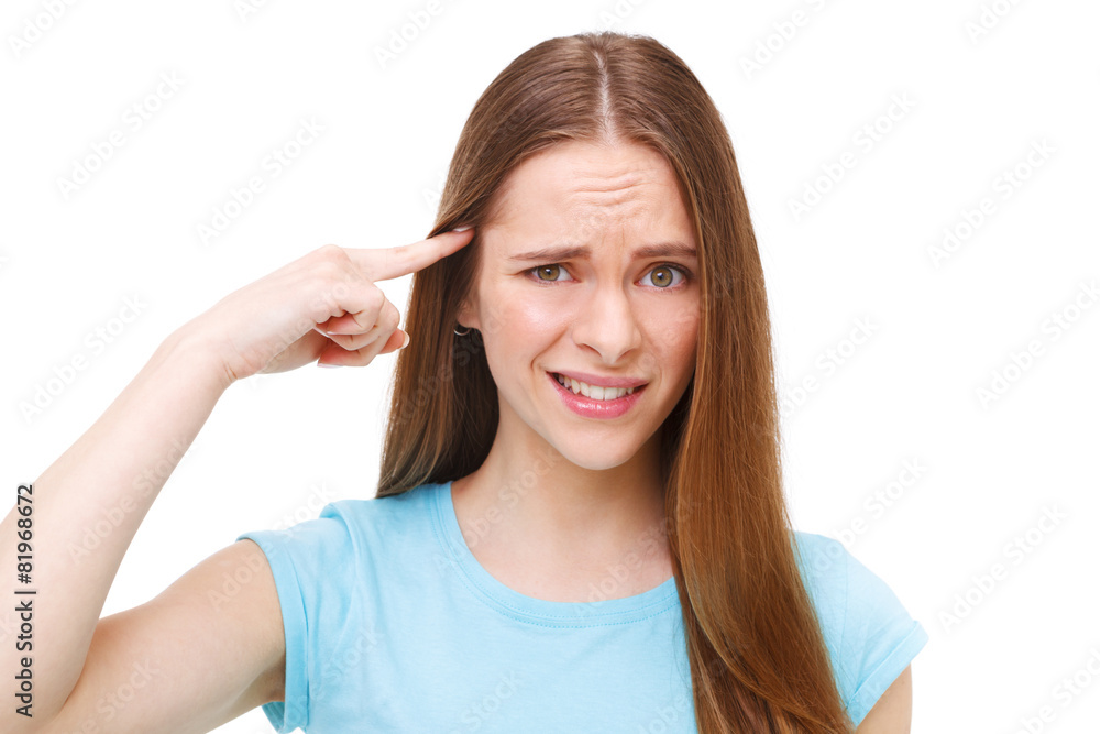Are you crazy? Young beautiful woman gesturing finger against he Are you crazy? Young beautiful woman gesturing finger against he