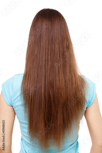 Woman with long straight brown hair isolated on white.