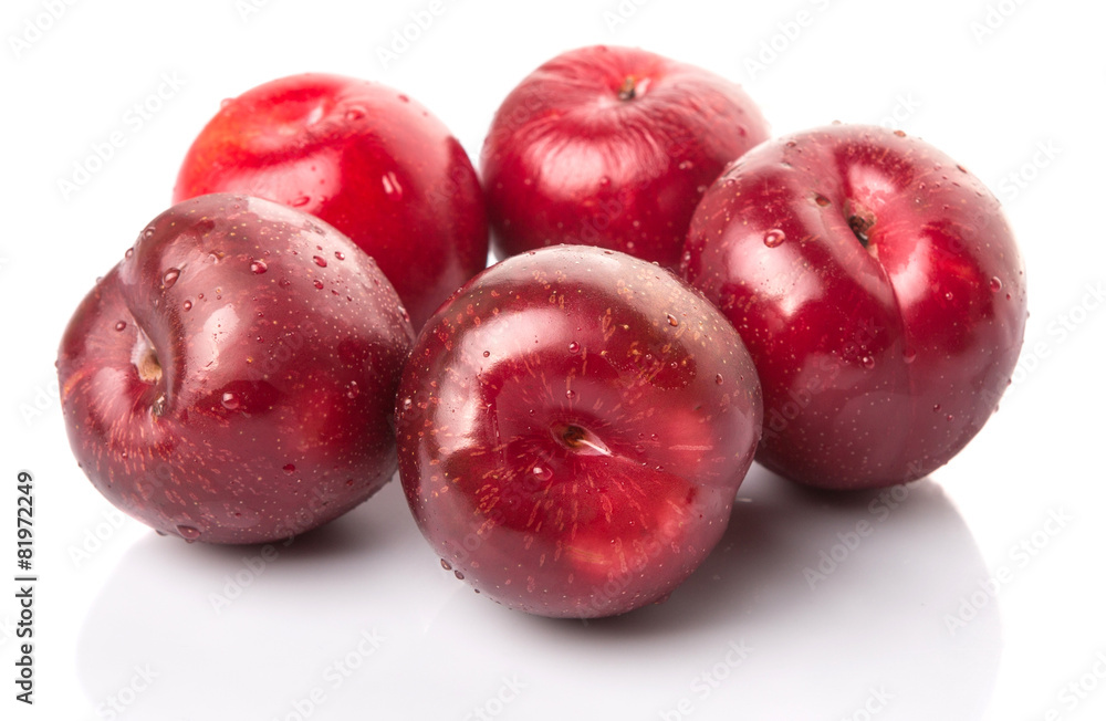 Victoria plum or red plum over white background