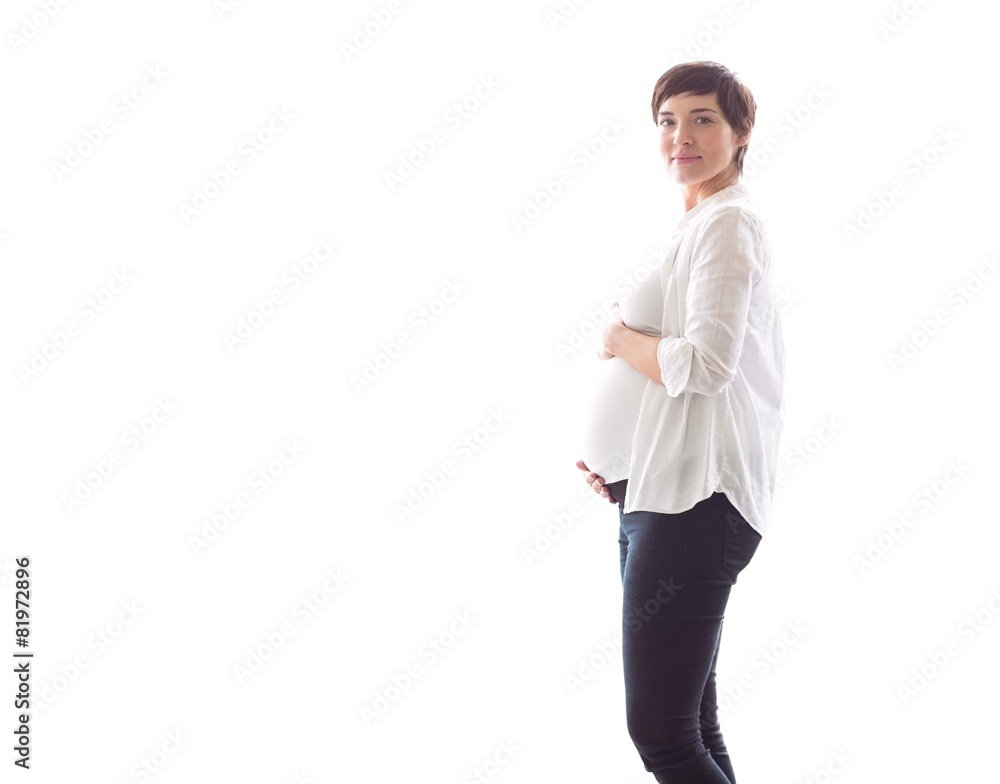 Pregnant woman holding her bump Pregnant woman holding her bump