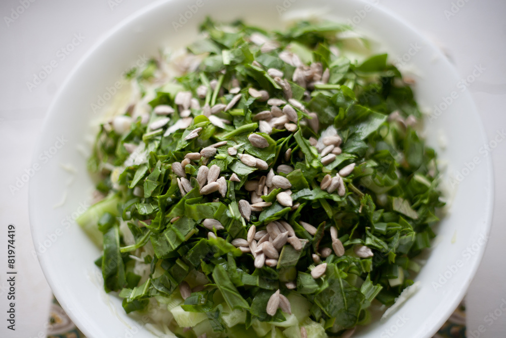 Plate of healthy green vegetables salad top view Plate of healthy green vegetables salad top view