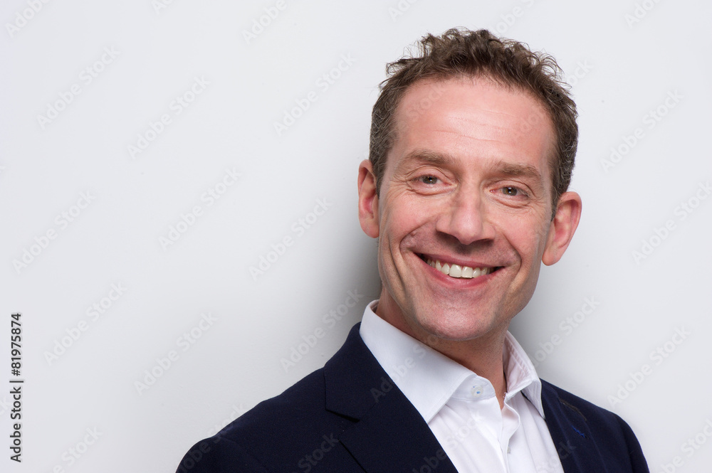 Confident businessman smiling Confident businessman smiling