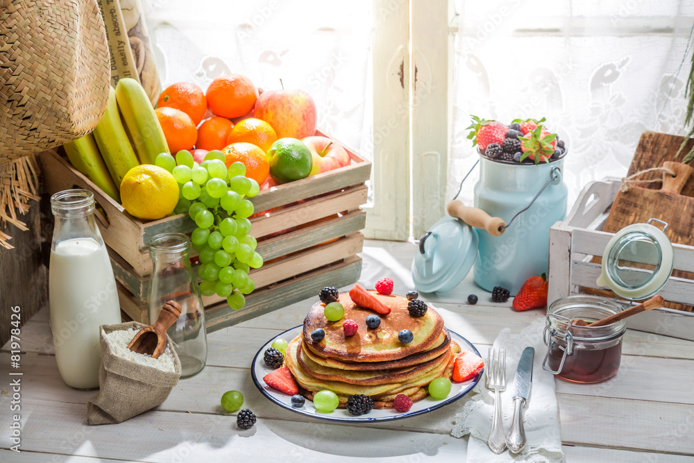 Healthy pancakes with fruits and maple syrup Healthy pancakes with fruits and maple syrup