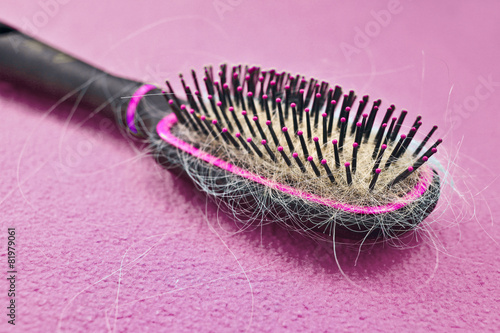 Hairbrush full of lost hair photo