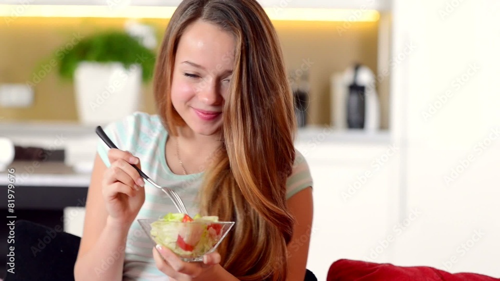 Beautiful Girl Eating Vegetable Salad. Dieting Concept Beautiful Girl Eating Vegetable Salad. Dieting Concept
