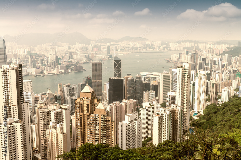 HONG KONG - APRIL 15, 2014: Hong Kong skyline on a spring day. H