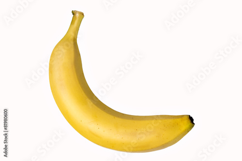 Single banana isolated on a white background
