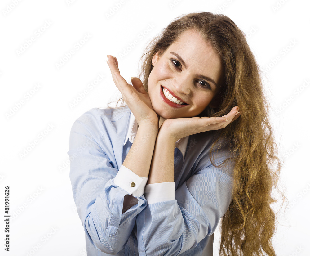 Portrait of a beautiful smiling young woman dressed in a blue sh Portrait of a beautiful smiling young woman dressed in a blue sh