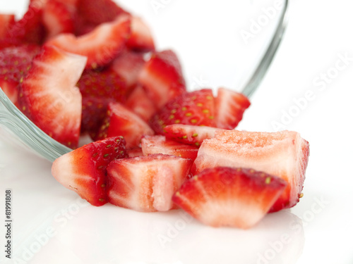 Diced strawberry fallen from cup