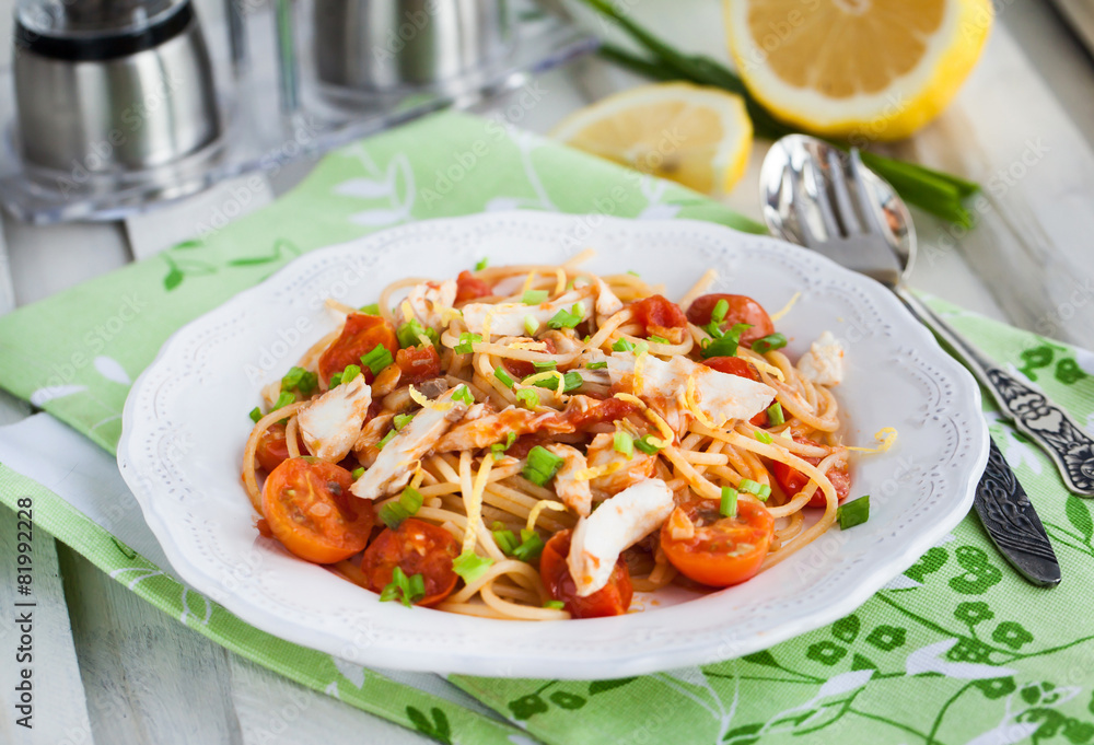 Fresh delicious pasta with fish and tomato sauce Fresh delicious pasta with fish and tomato sauce