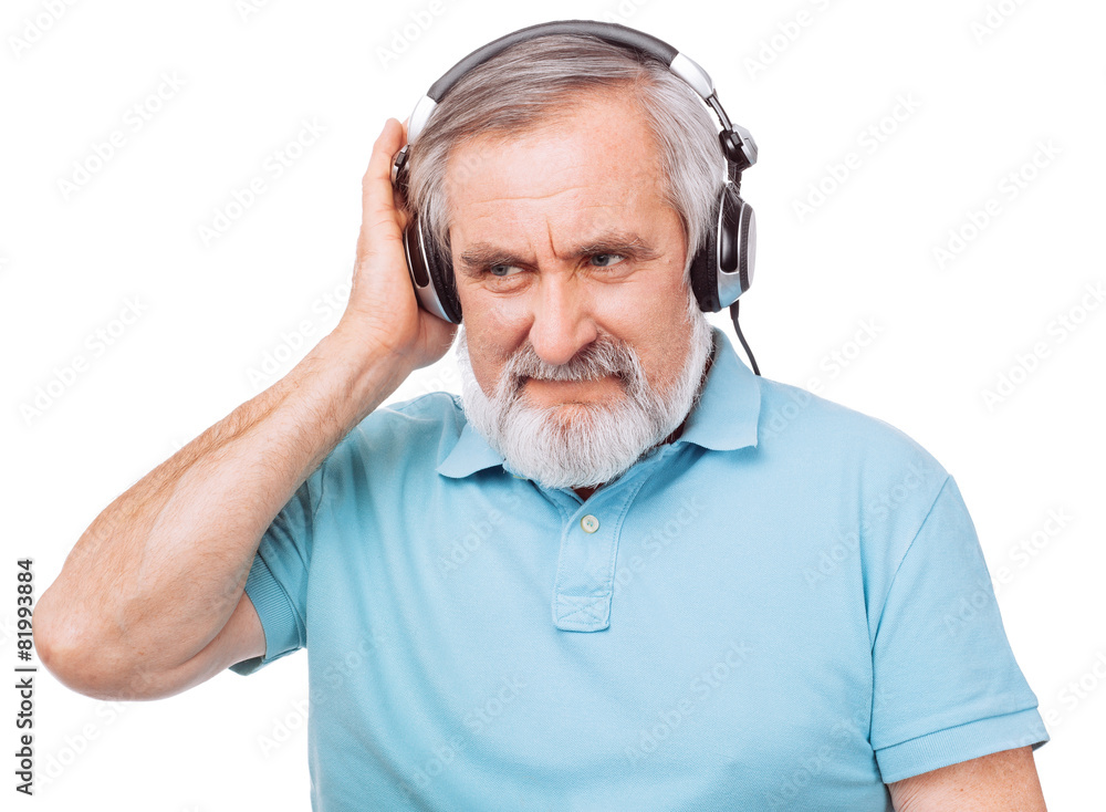 Old man enjoying music