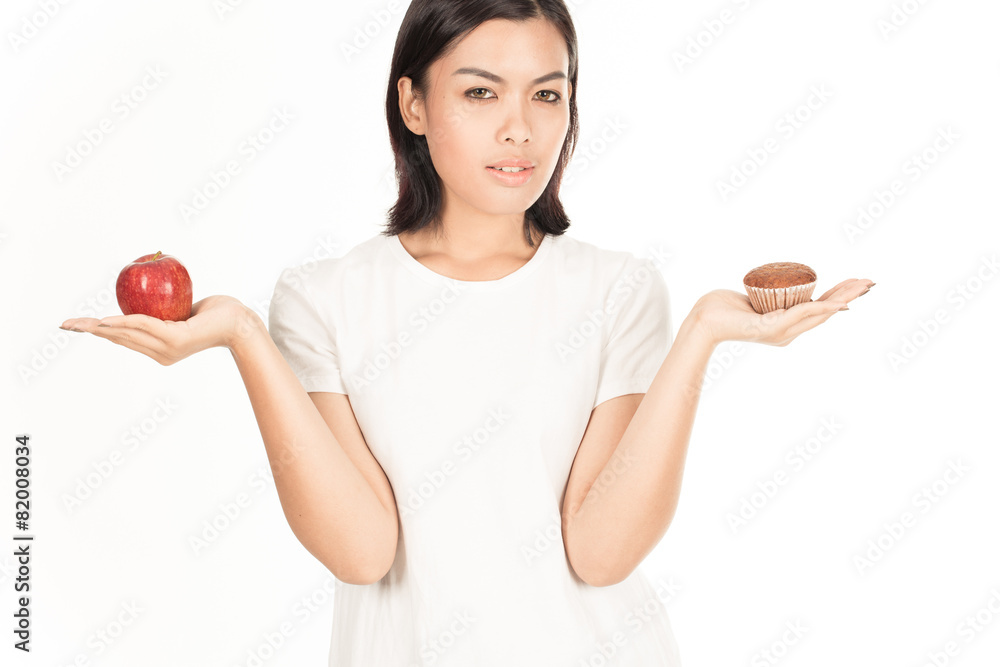 Smiling woman with apple isolated on white Smiling woman with apple isolated on white