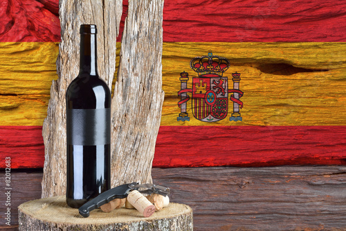 bottle of wine with Spain flag in the background