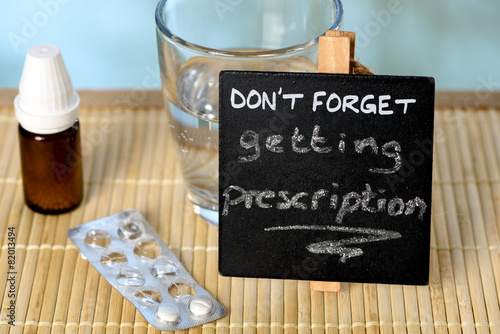 Prescription reminder on glass table