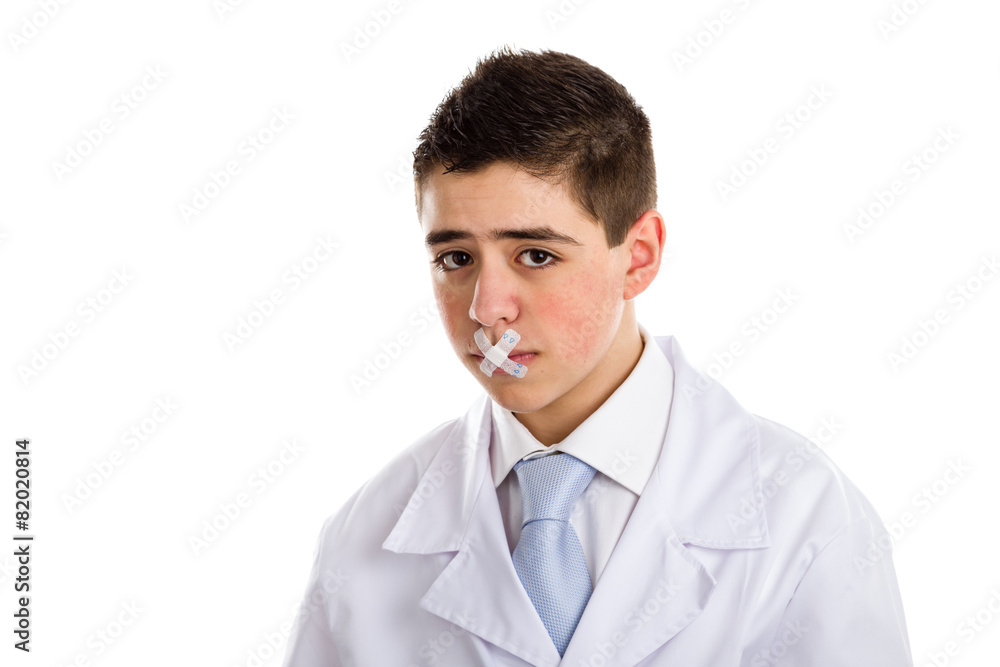 Band aids close the mouth of a boy doctor Band aids close the mouth of a boy doctor