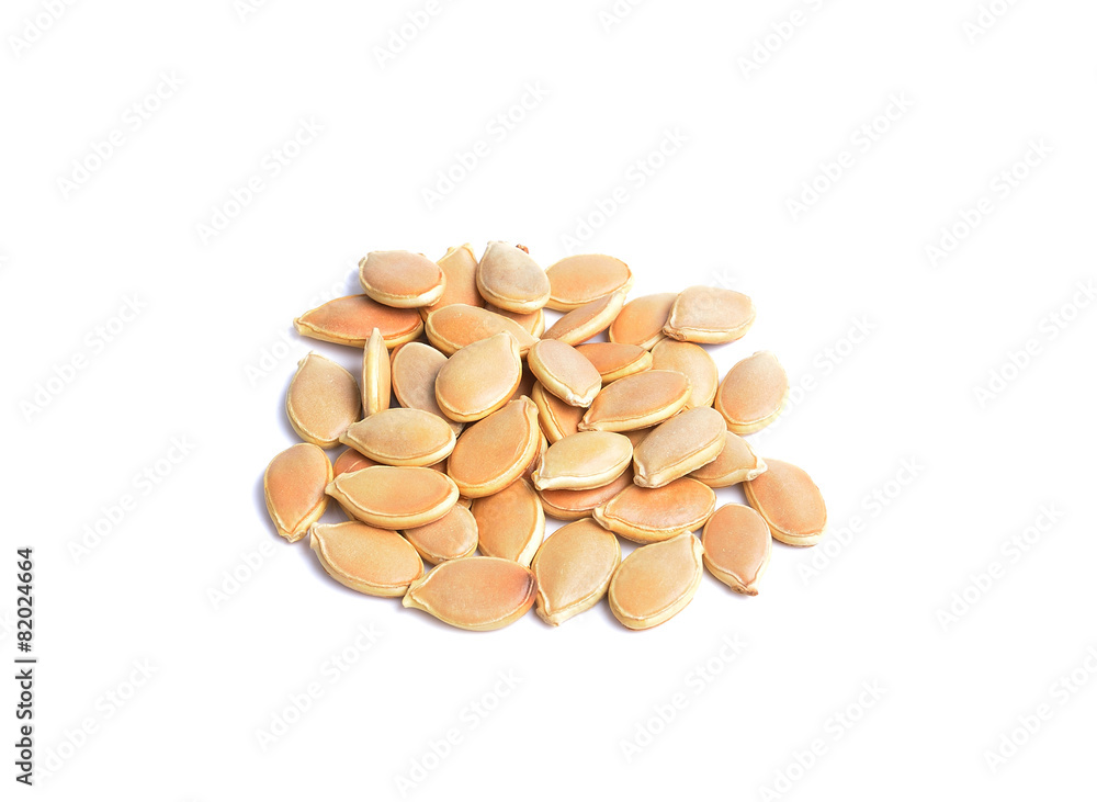 Dried pumpkin seeds on white background Dried pumpkin seeds on white background