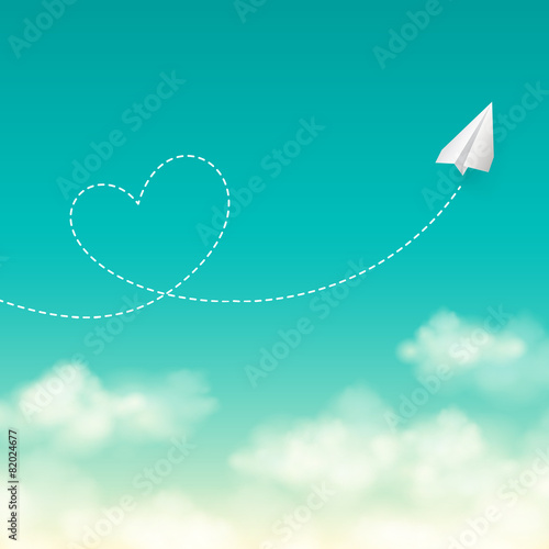 Love travel concept a paper plane flying in the sunny sky