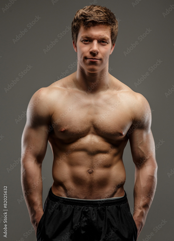 Attractive muscular young bodybuilder