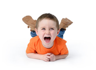 Happy child laughing on white background