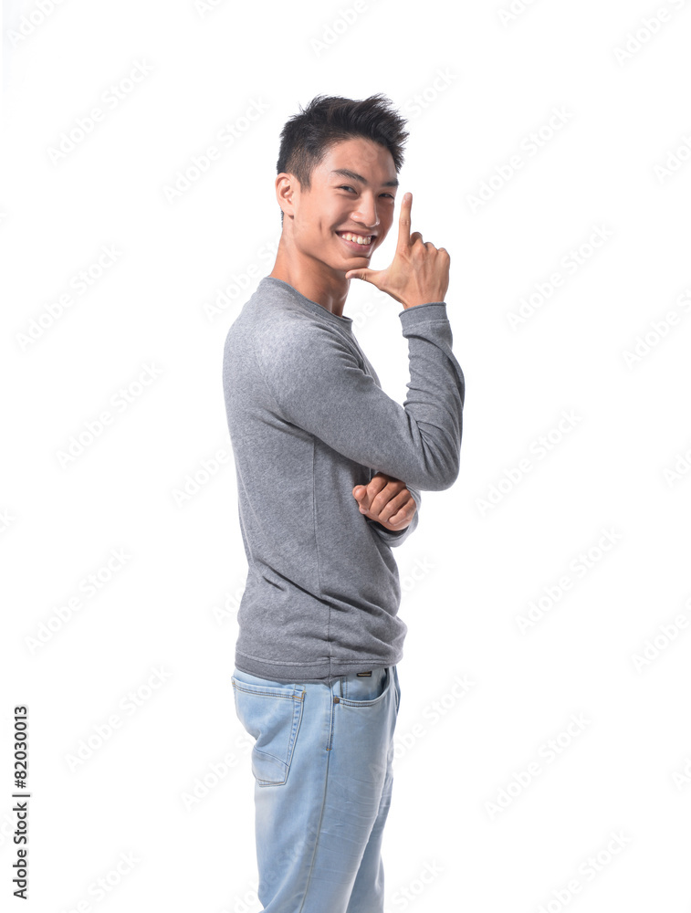 portrait of a side view young casual young man with hand gesture portrait of a side view young casual young man with hand gesture