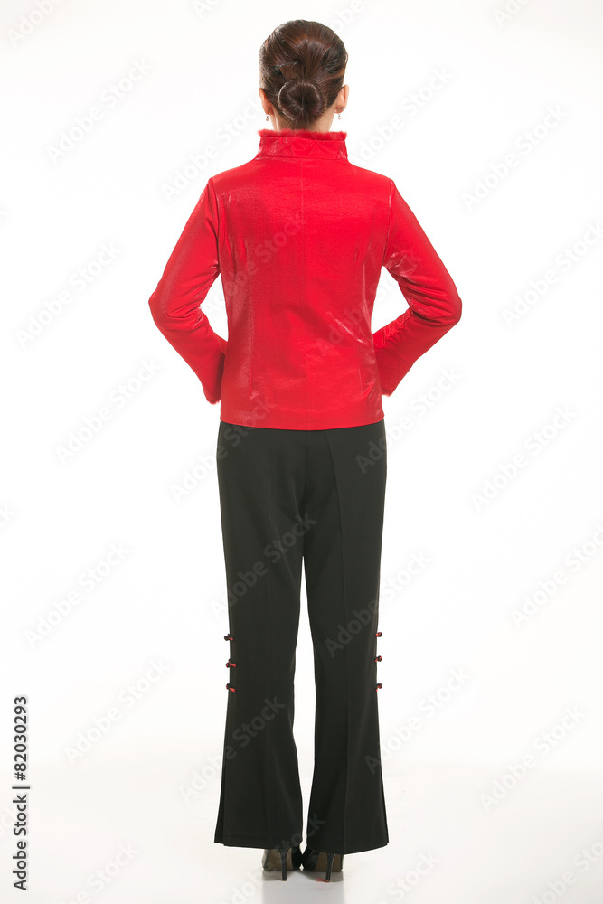 Fototapeta premium Wearing Chinese clothing waiter in front of a white background