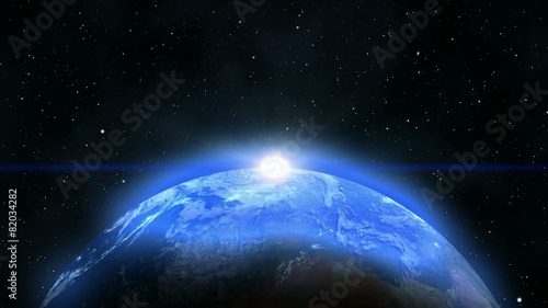 Blue Planet earth with sunrise in the space