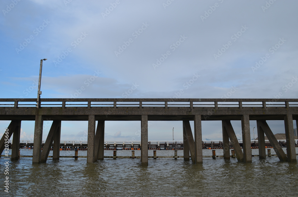 long pier into sea on Belgian coast long pier into sea on Belgian coast