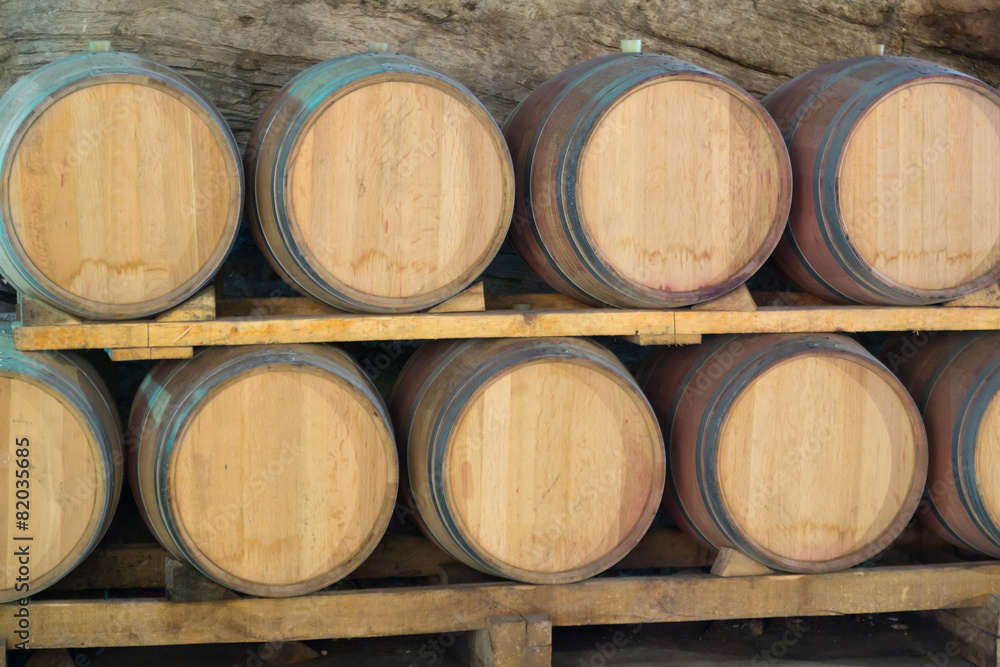wooden barrels in  winemaker cellar