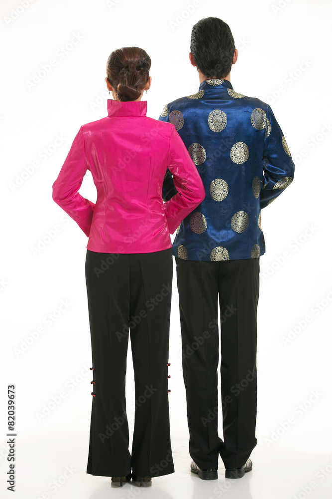 Fototapeta premium Wearing Chinese clothing waiter in front of a white background